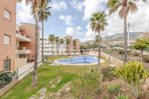 Výhled na bazén z ubytování 797 HOLIDAY RENTALS - Precioso apartamento con vistas a Arenal golf nebo okolí