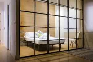 Posteľ alebo postele v izbe v ubytovaní -MalagaSunApts-Central&Cozy 3BDs