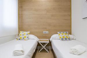 Posteľ alebo postele v izbe v ubytovaní -MalagaSunApts-Central&Cozy 3BDs