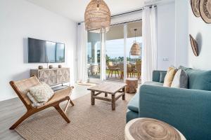 A seating area at LM10BB- Modern ground floor flat in Le Mirage