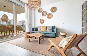 A seating area at LM10BB- Modern ground floor flat in Le Mirage