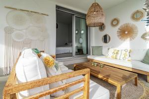 A seating area at LM10BB- Modern ground floor flat in Le Mirage