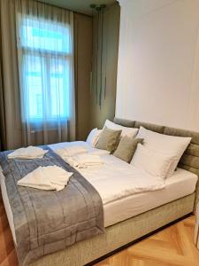 Posteľ alebo postele v izbe v ubytovaní Hotel Domus Collis