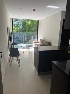 Zona de estar de Departamento de 1 habitación - Excelente ubicación- Villa Morra Asuncion #303