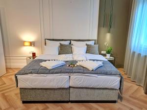 Posteľ alebo postele v izbe v ubytovaní Hotel Domus Collis