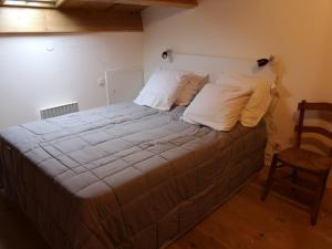 Postel nebo postele na pokoji v ubytování Le Clos de la PAIX