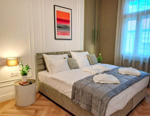 Posteľ alebo postele v izbe v ubytovaní Hotel Domus Collis