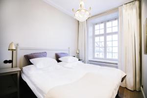 Llit o llits en una habitació de Hotel Kungsträdgården