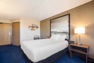 Postel nebo postele na pokoji v ubytování Americas Best Value Inn Sparks