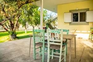 A garden outside Anastasios Olive Garden Apartments