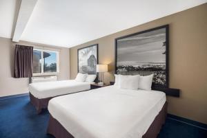 Postel nebo postele na pokoji v ubytování Americas Best Value Inn Sparks