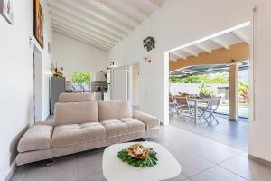 Posezení v ubytování Les Villas de la Cheminée