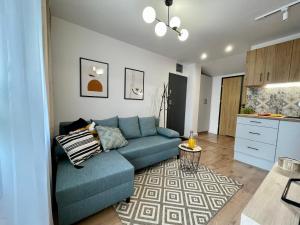 Posedenie v ubytovaní Apartament za Ratuszem - z balkonem
