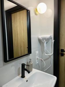 Kúpeľňa v ubytovaní Apartament za Ratuszem - z balkonem