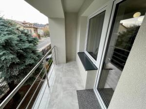 Balkón alebo terasa v ubytovaní Apartament za Ratuszem - z balkonem
