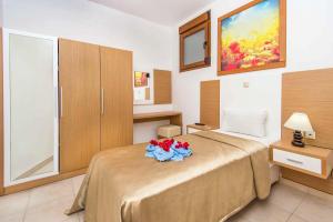 Posteľ alebo postele v izbe v ubytovaní Villa Kiotari Alia
