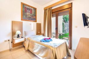 Posteľ alebo postele v izbe v ubytovaní Villa Kiotari Alia + 37 fotografií