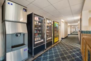 a hallway of a hospital with a vending machine at Americas Best Value Inn Sparks in Sparks