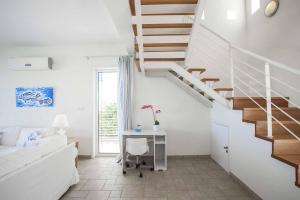Postel nebo postele na pokoji v ubytování Villa Melissa Selana