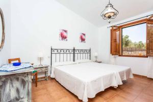 Postel nebo postele na pokoji v ubytování Villa Ignaci