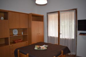 TV a/nebo společenská místnost v ubytování Case 800 mt dal mare - Casa Flora e Casa Aurora