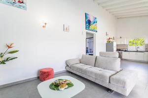 Posezení v ubytování Les Villas de la Cheminée