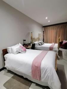 Voodi või voodid majutusasutuse Mi Vida Guesthouse toas