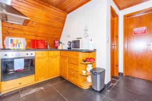 Cuisine ou kitchenette dans l'établissement Bangaló in Serra da Estrela