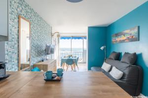 Un lugar para sentarse en La Plage O Maeva - Vue Mer d'exception - Parking privé - Wifi - La Grande Motte