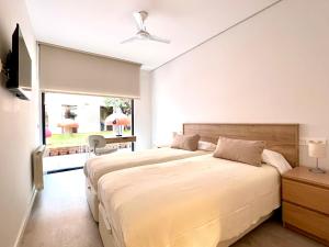 En eller flere senge i et værelse på Housingleón - Palacio de Don Ramiro