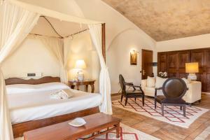 Кровать или кровати в номере Hotel Costa dei Fiori +37 фотографий
