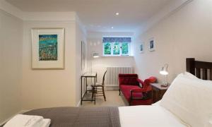 Postel nebo postele na pokoji v ubytování Loughrigg Cottage