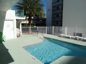 a swimming pool in the middle of a building at 3800 Ocean Blvd Luxury 501- Direct Oceanfront Condo! in Cocoa Beach