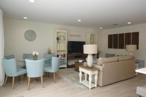 a living room with a couch and a table at 213 Grant Ave in Cocoa Beach