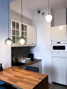 Kuchyňa alebo kuchynka v ubytovaní Absynt Hostel Wrocław