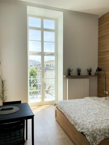 Posteľ alebo postele v izbe v ubytovaní Absynt Hostel Wrocław