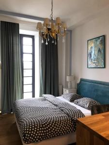 Posteľ alebo postele v izbe v ubytovaní Absynt Hostel Wrocław