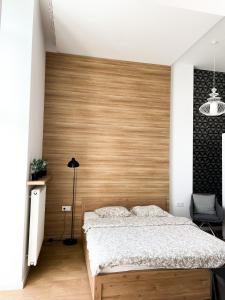 Posteľ alebo postele v izbe v ubytovaní Absynt Hostel Wrocław