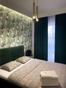 Posteľ alebo postele v izbe v ubytovaní Absynt Hostel Wrocław