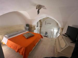 A bed or beds in a room at Handy Margherita