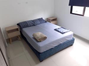 Кровать или кровати в номере Tranquilo y cómodo apartamento en San Fernando Viejo