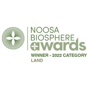 a logo for the noosa blossom and warden championships at Rosecliffe Boutique Farm Cottages in Pomona