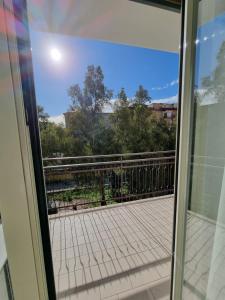 a view from a sliding glass door of a balcony at Viento 'e terra in San Giorgio a Cremano