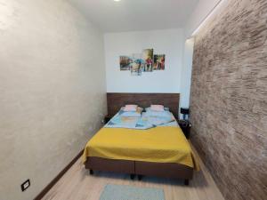 Posteľ alebo postele v izbe v ubytovaní Apartamenty A&B Gold
