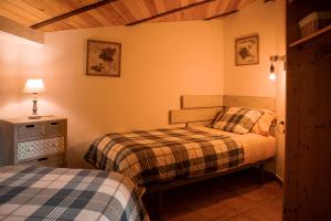 Postel nebo postele na pokoji v ubytování Apartament Cadí- Moixeró