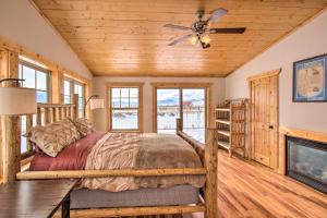 a bedroom with a bed and a ceiling fan at Picturesque Cabin Less Than 1 Mi to Yellowstone River in Livingston