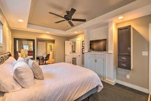a bedroom with a bed and a flat screen tv at Luxe Lyndon Home Less Than 11 Mi to Dtwn Louisville! in Louisville