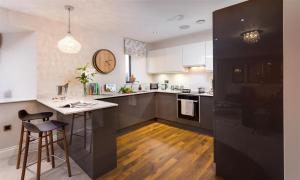 Kuchyň nebo kuchyňský kout v ubytování Hygge at No 8 + 9 fotografií