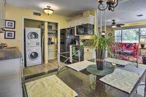 a kitchen with a washer and dryer at Nokomis Home with Gas Grill 2 Blocks to Beach! in Nokomis