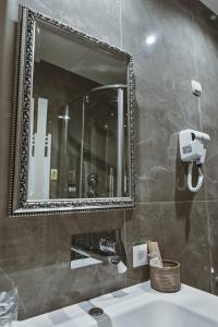 Koupelna v ubytování Garni hotel BARUT